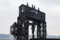 Ruins of the 69th Street Transfer Bridge in the Hudson River of New York City on a Foggy Day