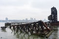 Ruins of the 69th Street Transfer Bridge in the Hudson River of New York City on a Foggy Day