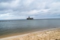 Ruins of torpedownia on Baltic Sea at cloudy day.