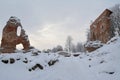 Ruins of the Viljandi Order Castle in winter. Some frosty trees and snow everywhere Royalty Free Stock Photo