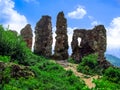 The ruins of the walls of the Khust castle Transcarpathia, Ukraine on the top of the hill. The remains of destroyed stone