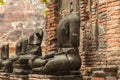 Ruins of Wat Mahathat temple and beheaded Buddha statues. Ayutthaya, Thailand Royalty Free Stock Photo