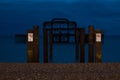 The ruins of West Pier, Brighton, Sussex, UK, photographed at dusk on a cold winter`s day. Royalty Free Stock Photo