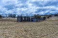 The ruins of a wooden house on the sandy beach