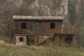 Ruins of wooden house in Vrsatec village in spring dark cloudy day Royalty Free Stock Photo