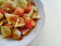 Lotis buah or rujak sweat, sour, spicy and fresh. fruit with hot chili paste. indonesian traditional fruit salad