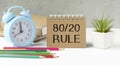 the 80 20 rule text on white paper on a table