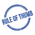 RULE OF THUMB text written on blue grungy round stamp