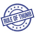 RULE OF THUMB text written on blue vintage round stamp