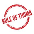 RULE OF THUMB text written on red grungy round stamp
