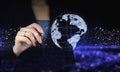 Rule the world, world domination concepts. Hand holding digital graphic pen and drawing digital hologram world, earth, map, globe Royalty Free Stock Photo