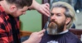 Rule yourself. barber or hairdresser tool. brutal hipster at barbershop. bearded client visiting hairdresser. Time for