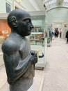 Statue of Gudea made of carved and polished mottled green dolerite at the British Museum