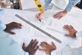 Ruler, top view and hands with blueprint, team and planning for new project, brainstorming and deadline. Closeup, zoom Royalty Free Stock Photo