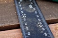 ruler and wooden shavings on the boards Royalty Free Stock Photo