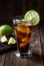 Rum and cola Cuba Libre drink with brown rum, cola, ice and lime Royalty Free Stock Photo