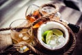 Rum with ice and coconut, a bottle of rum with lime Royalty Free Stock Photo