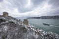 Rumeli Fortress, an old castle with a snow-covered view in winter, Istanbul, TÃÂ¼rkiye. Rumeli Castle with Fatih Sultan Mehmet Royalty Free Stock Photo