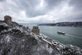 Rumeli Fortress, an old castle with a snow-covered view in winter, Istanbul, TÃÂ¼rkiye. Rumeli Castle with Fatih Sultan Mehmet Royalty Free Stock Photo