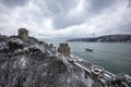 Rumeli Fortress, an old castle with a snow-covered view in winter, Istanbul, TÃÂ¼rkiye. Rumeli Castle with Fatih Sultan Mehmet Royalty Free Stock Photo