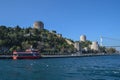 Rumeli Hisari and the Fatih Sultan Mehmed Bridge tower over Turkeyâs Bosphorus Royalty Free Stock Photo