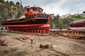 Rumelifeneri dock workers launching a ship