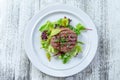 Rump Steak with Green vegetable,French beab, pepper close up on plate Royalty Free Stock Photo