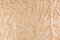 Rumpled beige background. Real texture of the wrapping texture