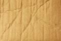 Rumpled brown corrugated cardboard or box texture background. Royalty Free Stock Photo