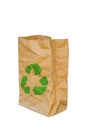 Rumpled brown paper bag opened with green recycle sign, Isolated