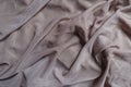 Rumpled dull dusky pink polyester mesh fabric Royalty Free Stock Photo