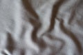 Rumpled grey fabric with dupplins checks