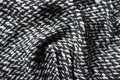 Rumpled black and white rayon fabric Royalty Free Stock Photo
