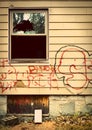 Run down house with graffiti Royalty Free Stock Photo