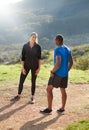 Run in places you love with people you love. two athletes chatting before their run. Royalty Free Stock Photo