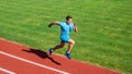 Run into shape. Running challenge for beginners. Athlete run track grass background. Sprinter training at stadium track