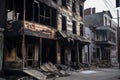 rundown building on burned city street, with broken windows and charred exterior