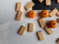 Runes made by hand from wood on a gray background