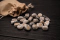 Runes stones with symbols. Stack of runes on gray background.