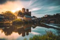 Runkel, a romantic place in Hesse on the Lahn. Real old Stonebridge with dramatic sky. reflection Royalty Free Stock Photo