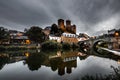 Runkel, a romantic place in Hesse on the Lahn. Real old Stonebridge with dramatic sky. reflection Royalty Free Stock Photo