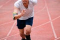 Runner athelete man running on the trackrace . Jogging for healthy concept Royalty Free Stock Photo