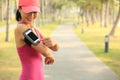 Runner athlete listening to music in headphones Royalty Free Stock Photo