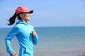 Runner athlete running on seaside of qinghai lake Royalty Free Stock Photo