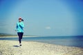 Runner athlete running on seaside of qinghai lake Royalty Free Stock Photo