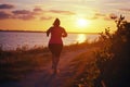 Runner athlete running at seaside. woman fitness jogging workout wellness concept