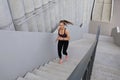 Runner athlete running on stairs. Woman fitness is jogging oudoors Royalty Free Stock Photo