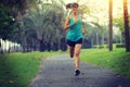 Runner athlete running at tropical park Royalty Free Stock Photo