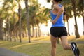 Runner athlete running at tropical park Royalty Free Stock Photo