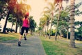 Runner athlete running at tropical park Royalty Free Stock Photo